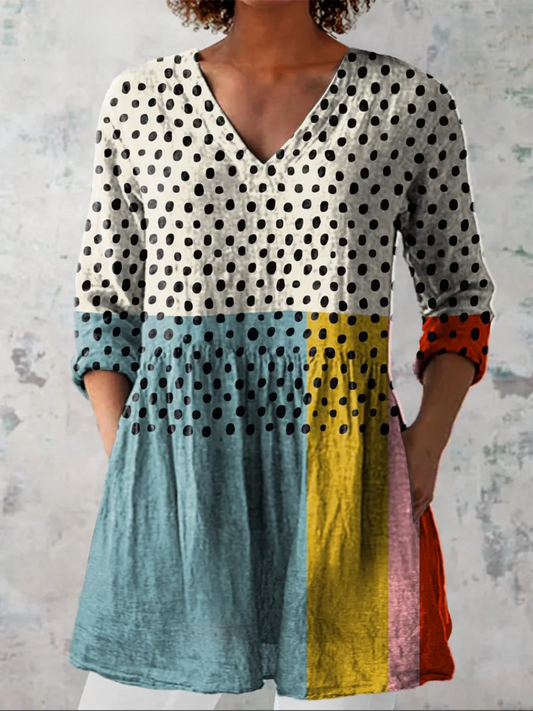 ELISABETH | BLUSA LARGA CON ESCOTE EN V