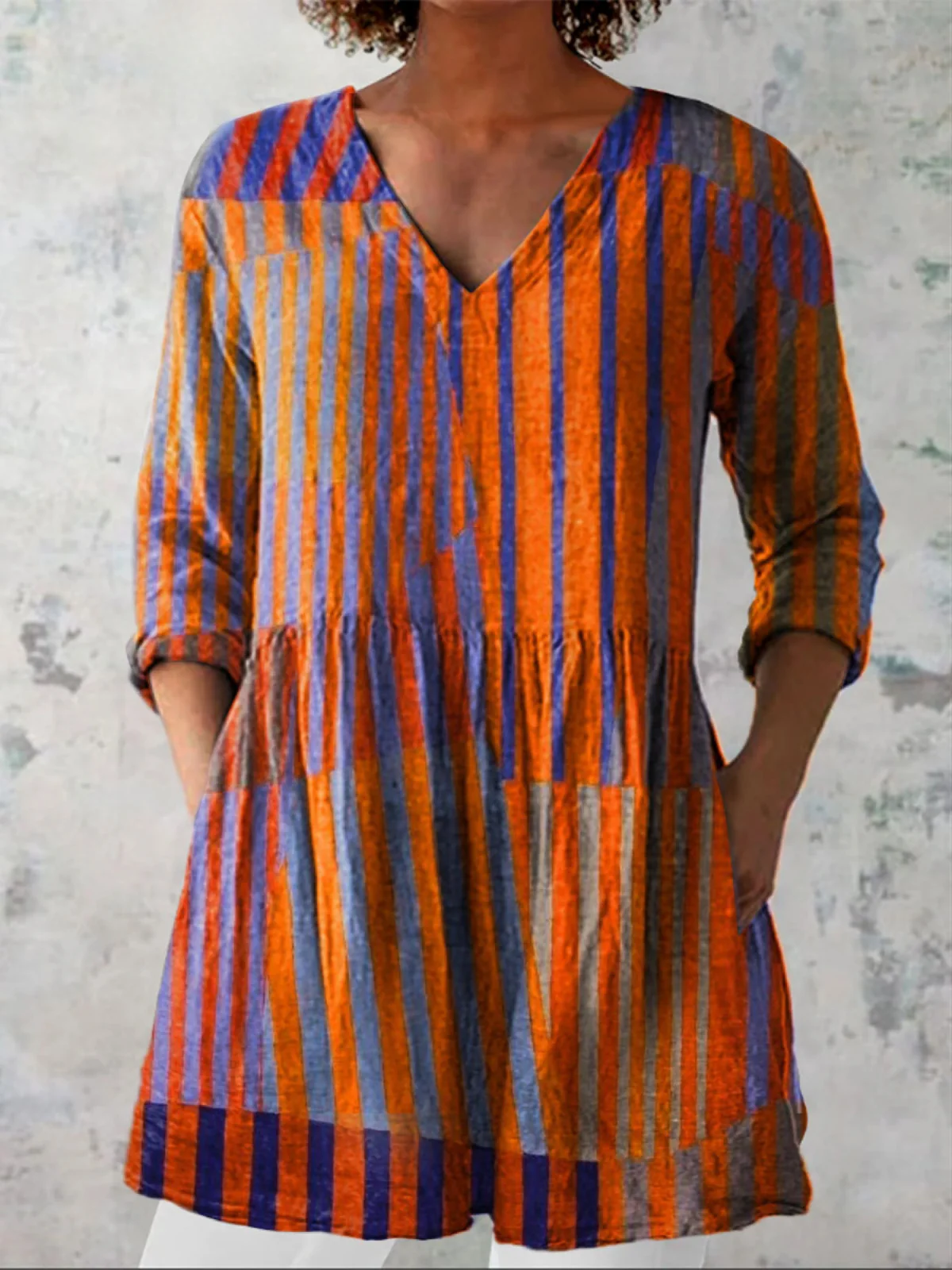 NOOR | BLUSA LARGA CON ESCOTE EN V