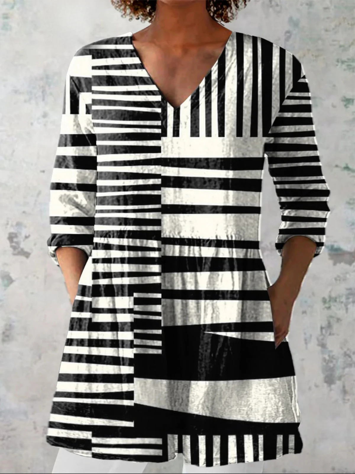 CAPRI | BLUSA LARGA CON ESCOTE EN V