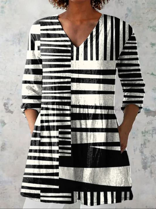 CAPRI | BLUSA LARGA CON ESCOTE EN V